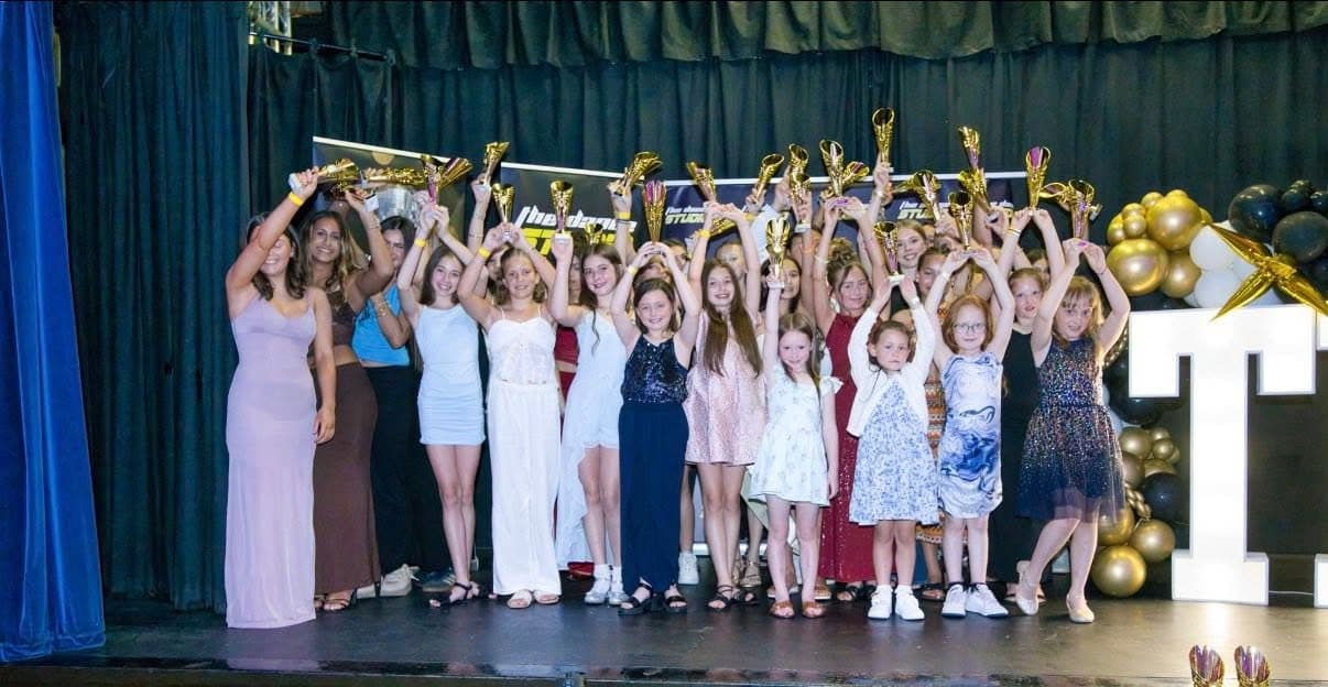 Awards night trophies raised